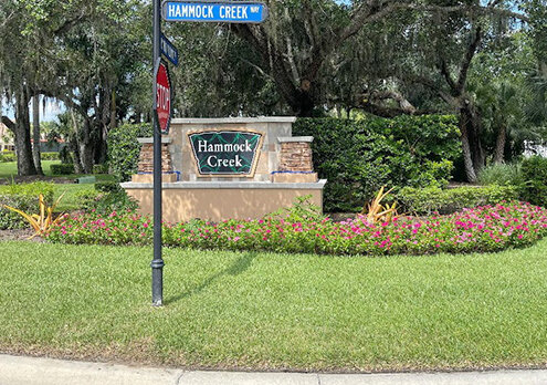 Hammock Creek entrance monument and plantings before renovation